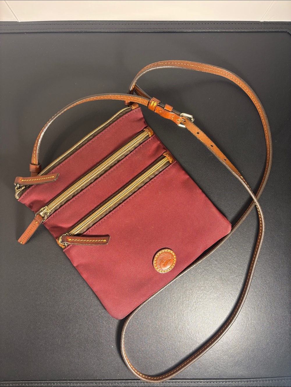 Dooney & Bourke Burgundy Nylon Crossbody with Tan Leather Trim